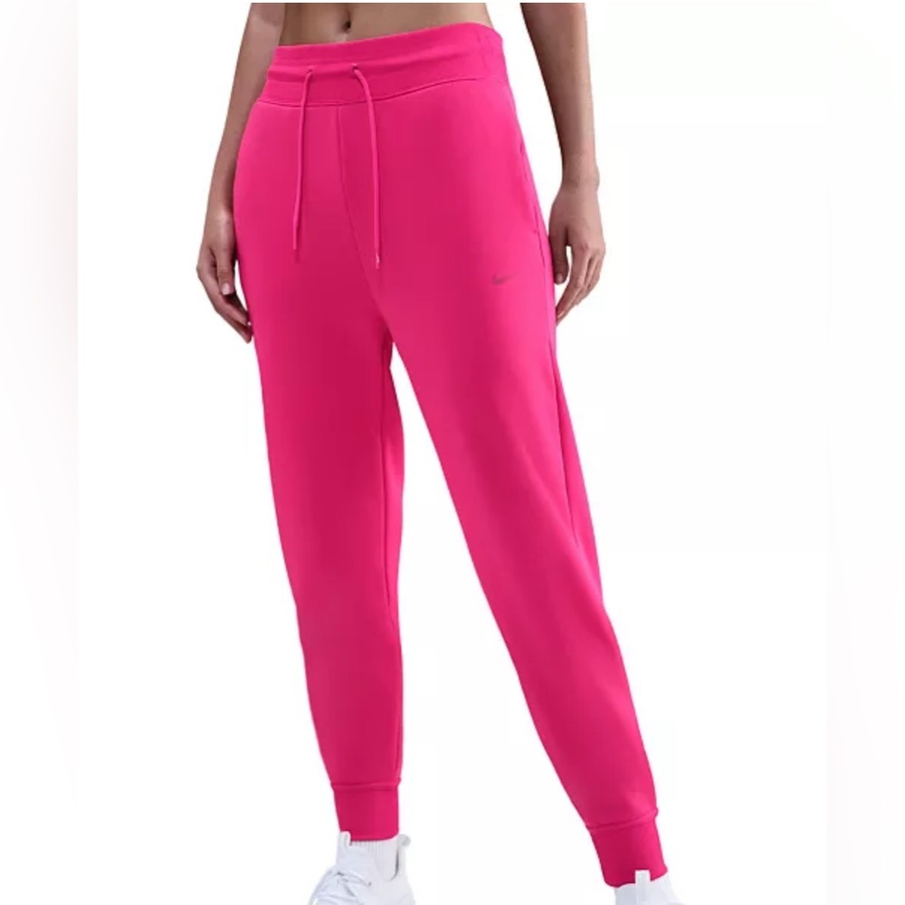Nike Therma-FIT 7/8-length jogger pants in Rush Pink
Women’s size Medium NWT